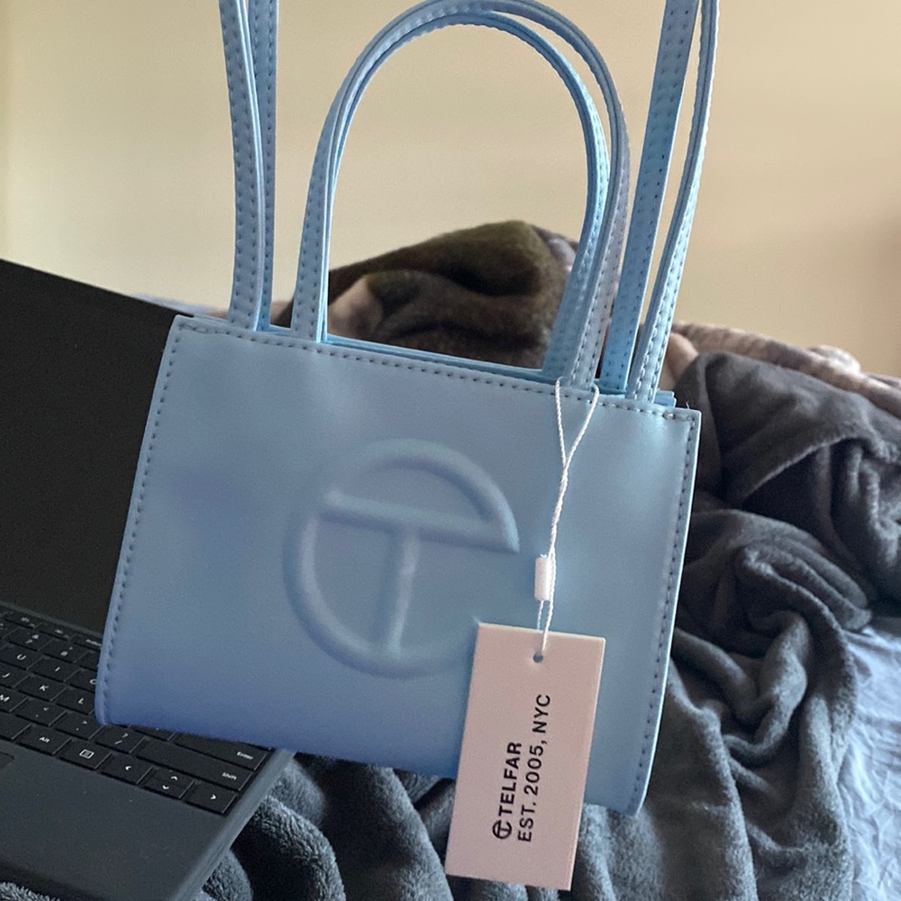 New bag just opened out of package I only took off the paper wrapping